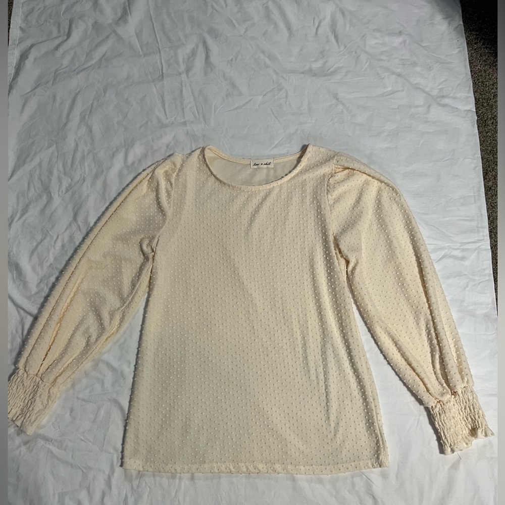 Cream colored blouse